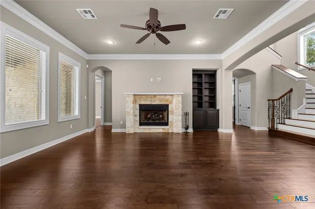 a spacious bathroom with a double vanity sink and mirror