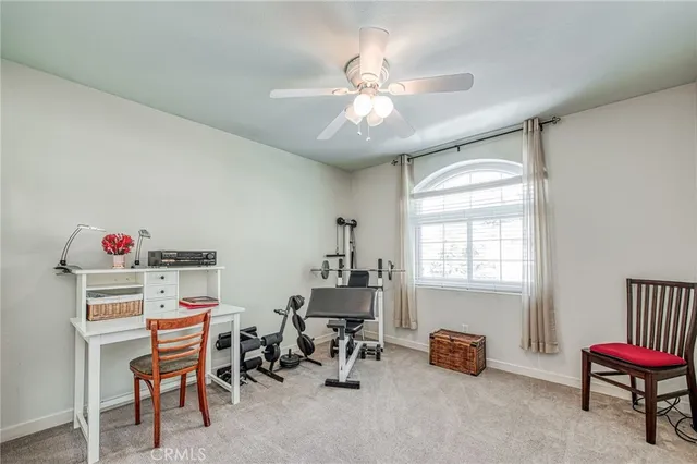 a workspace with furniture and a window