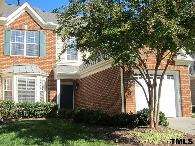 11238 Maplecroft Court Raleigh, NC 27617 - Photo 1 of 12 a front view of a house with a yard and trees