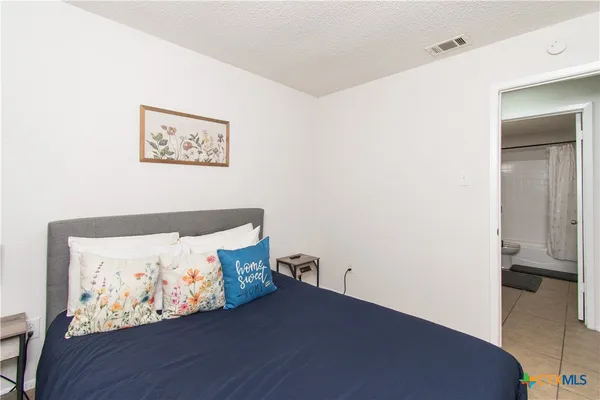 a bed room with a bed
