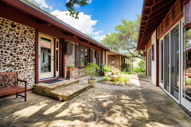 a view of a lake with a tree