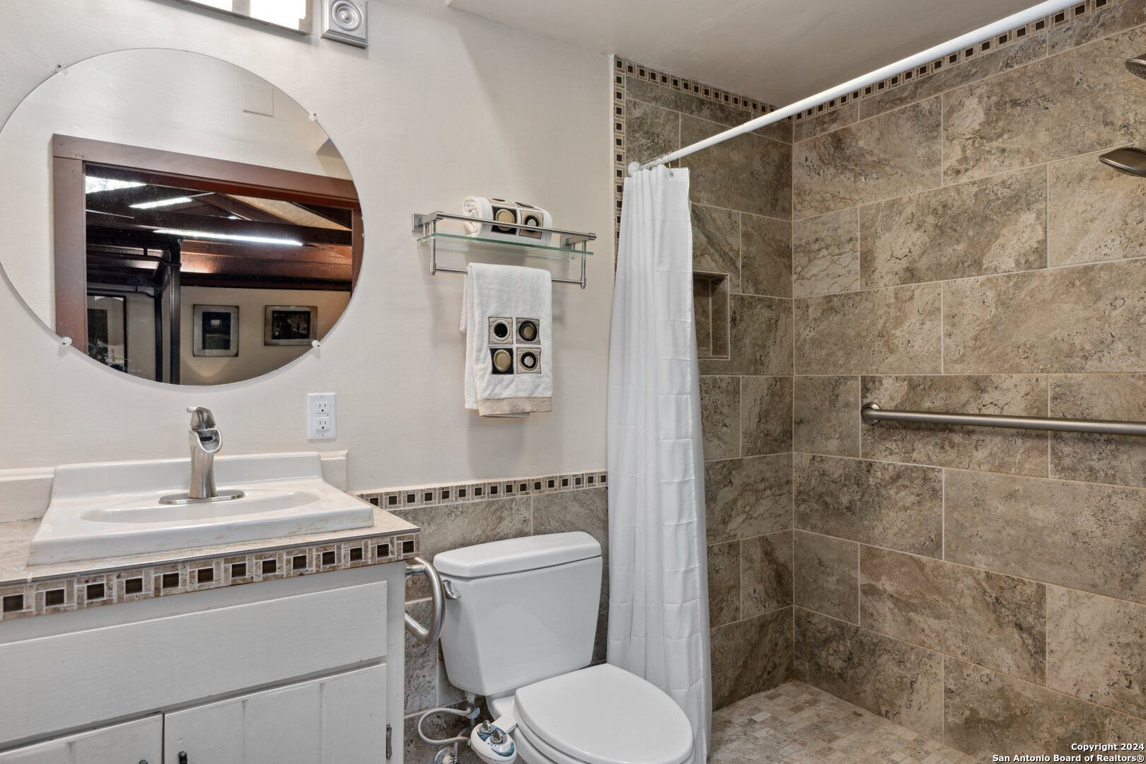 801 Mickle Creek Road Medina, TX 78055 - Photo 31 of 55 a bathroom with a sink toilet and shower