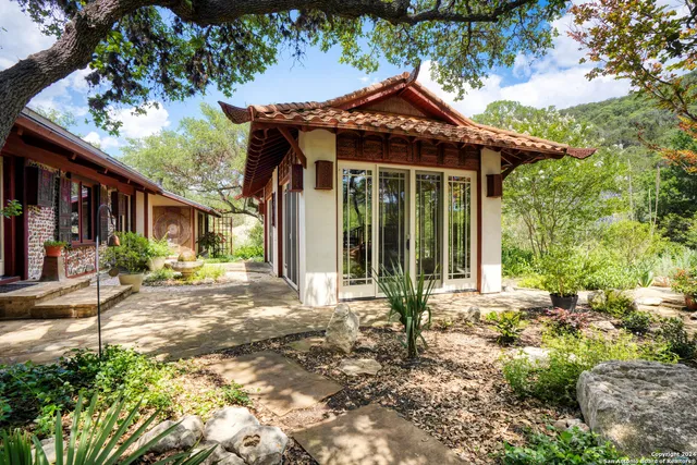 a view of a outdoor space with a garden and entertaining space
