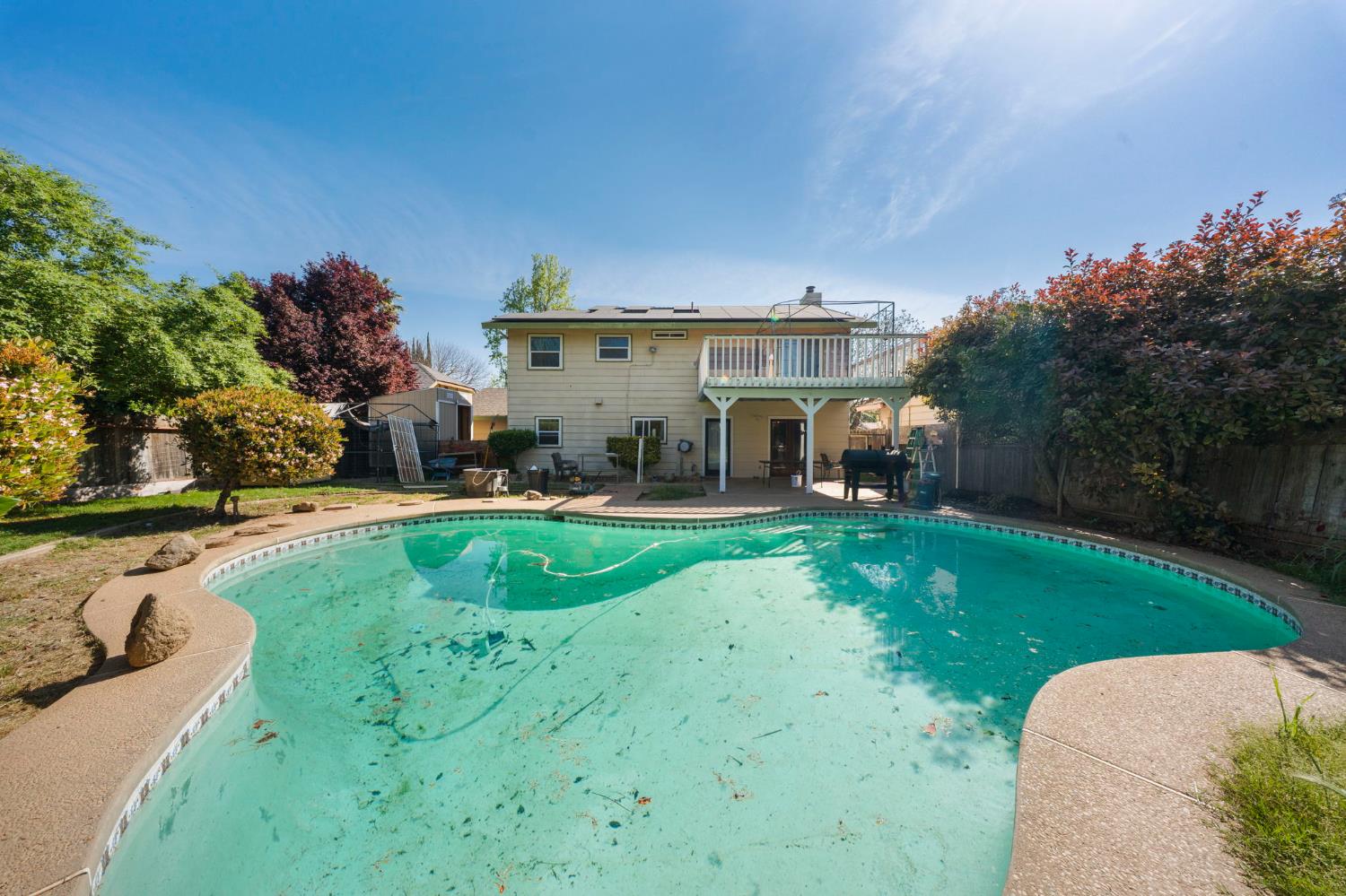 2779 Story Avenue Merced, CA 95340 - Photo 25 of 27 a front view of a house with garden
