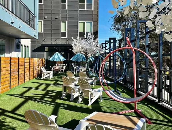 a view of an chairs and tables in the patio