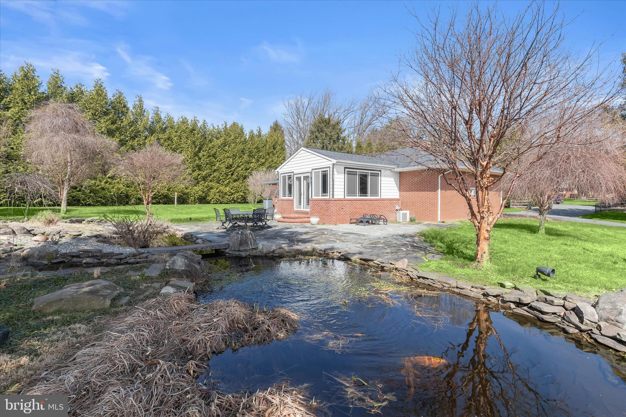 3919 West Chapel Road Aberdeen, MD 21001 - Photo 49 of 63 Rear Exterior with Waterfall Feature and Koi Pond