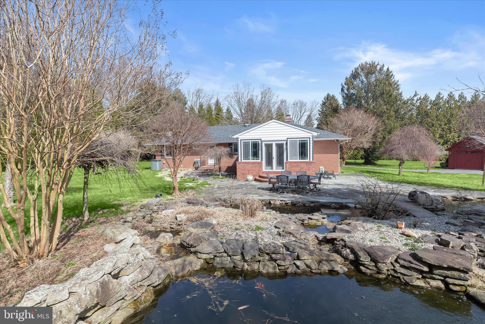 3919 West Chapel Road Aberdeen, MD 21001 - Photo 50 of 63 Rear Exterior with Waterfall Feature and Koi Pond