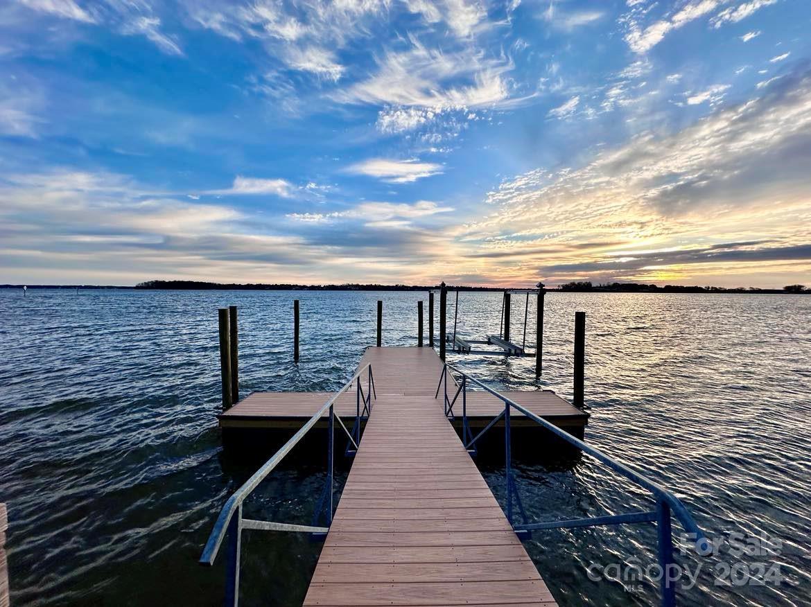 8303 Luckey Point Road Denver, NC 28037 - Photo 2 of 20 a view of wooden balcony with outdoor seating