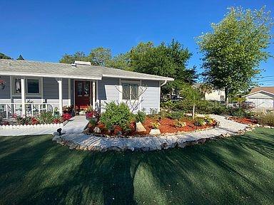 4794 Innisfil Street Palm Harbor, FL 34683 - Photo 1 of 1 a view of a house with backyard and sitting area