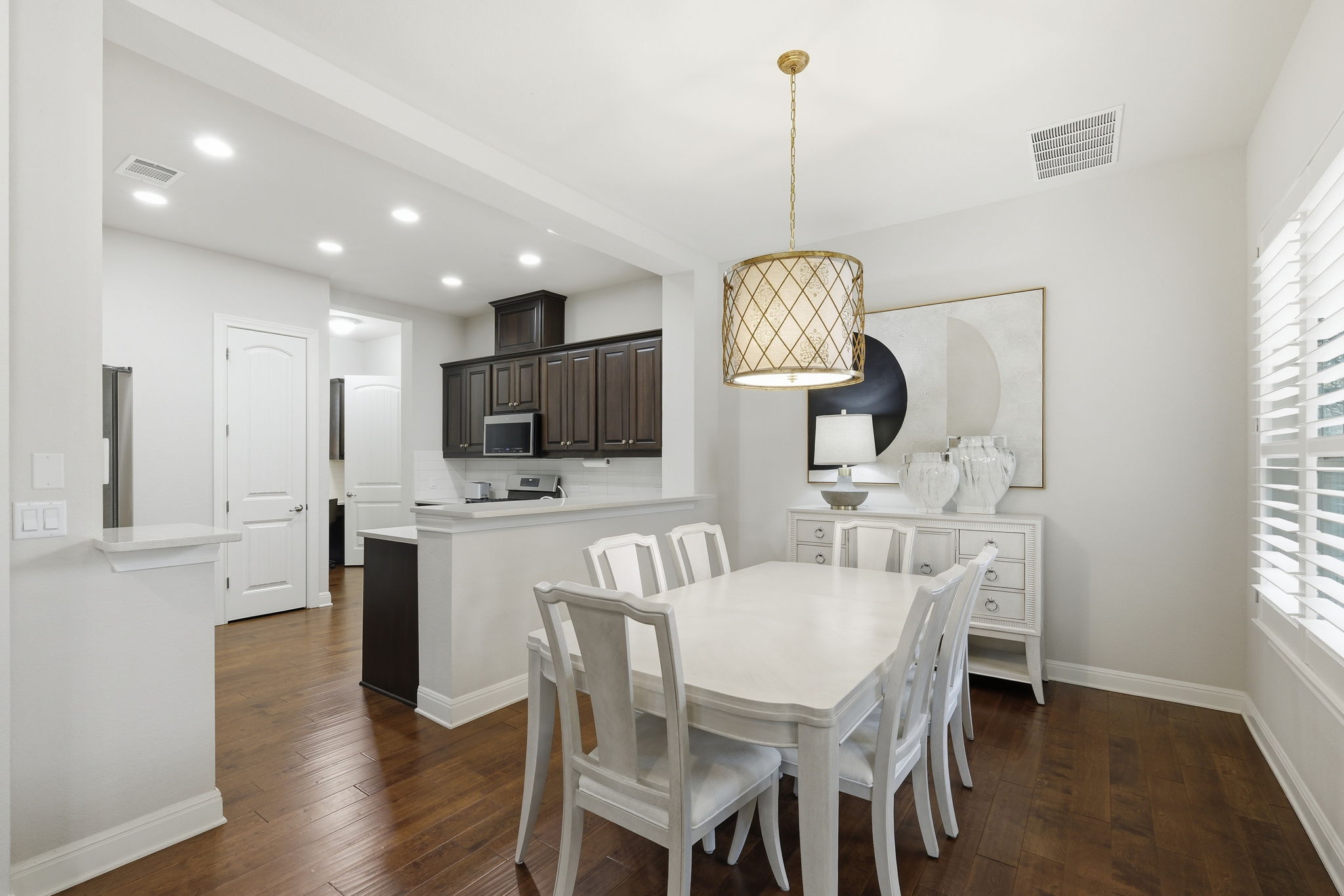 2608 Barbera Pass, Unit 90 Austin, TX 78748 - Photo 7 of 37 Dining room view with plantation shutters on windows.