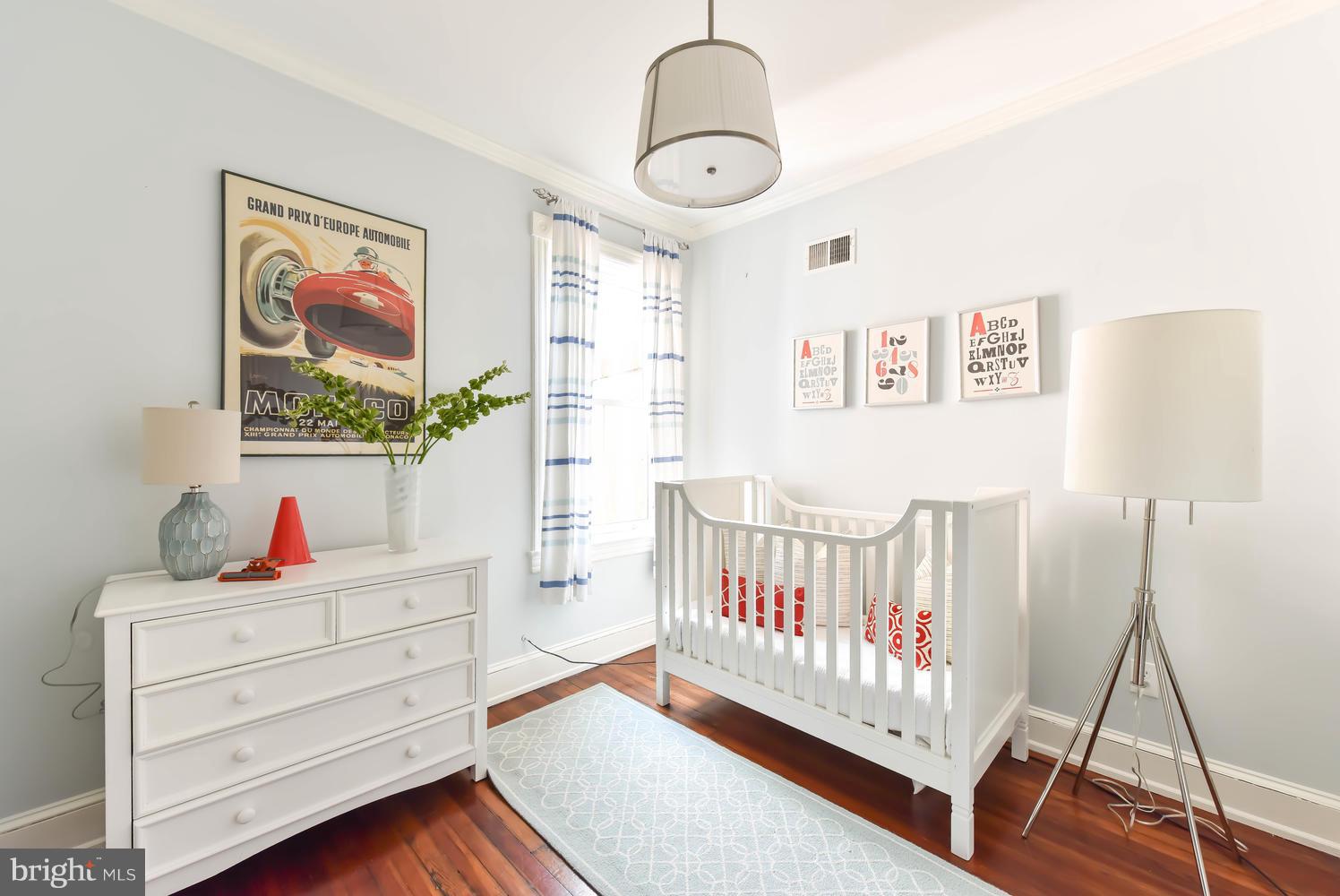 308 11th Street Southeast Washington, DC 20003 - Photo 19 of 30 a bedroom with furniture and a window