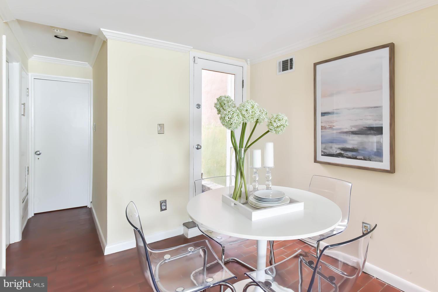 308 11th Street Southeast Washington, DC 20003 - Photo 28 of 30 a dining room with furniture and wooden floor