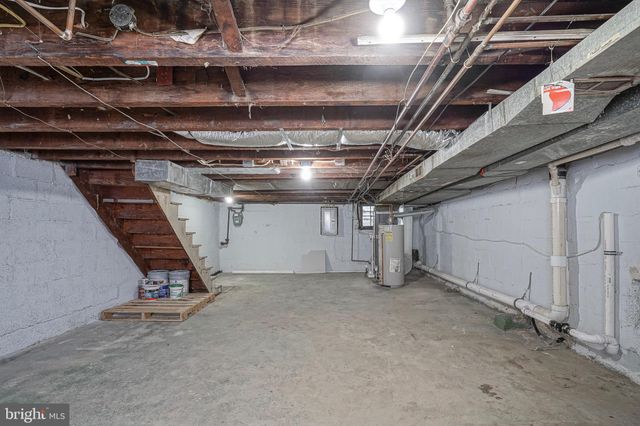 a view of balcony with wooden floor and fence