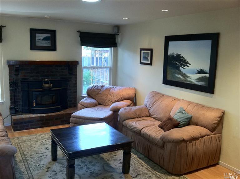 507 Squirrel Court Santa Rosa, CA 95401 - Photo 1 of 1 Awesome Living Room with Simulated Wood Floors Throughout, Recessed Lighting and Dual Pane Windows too!