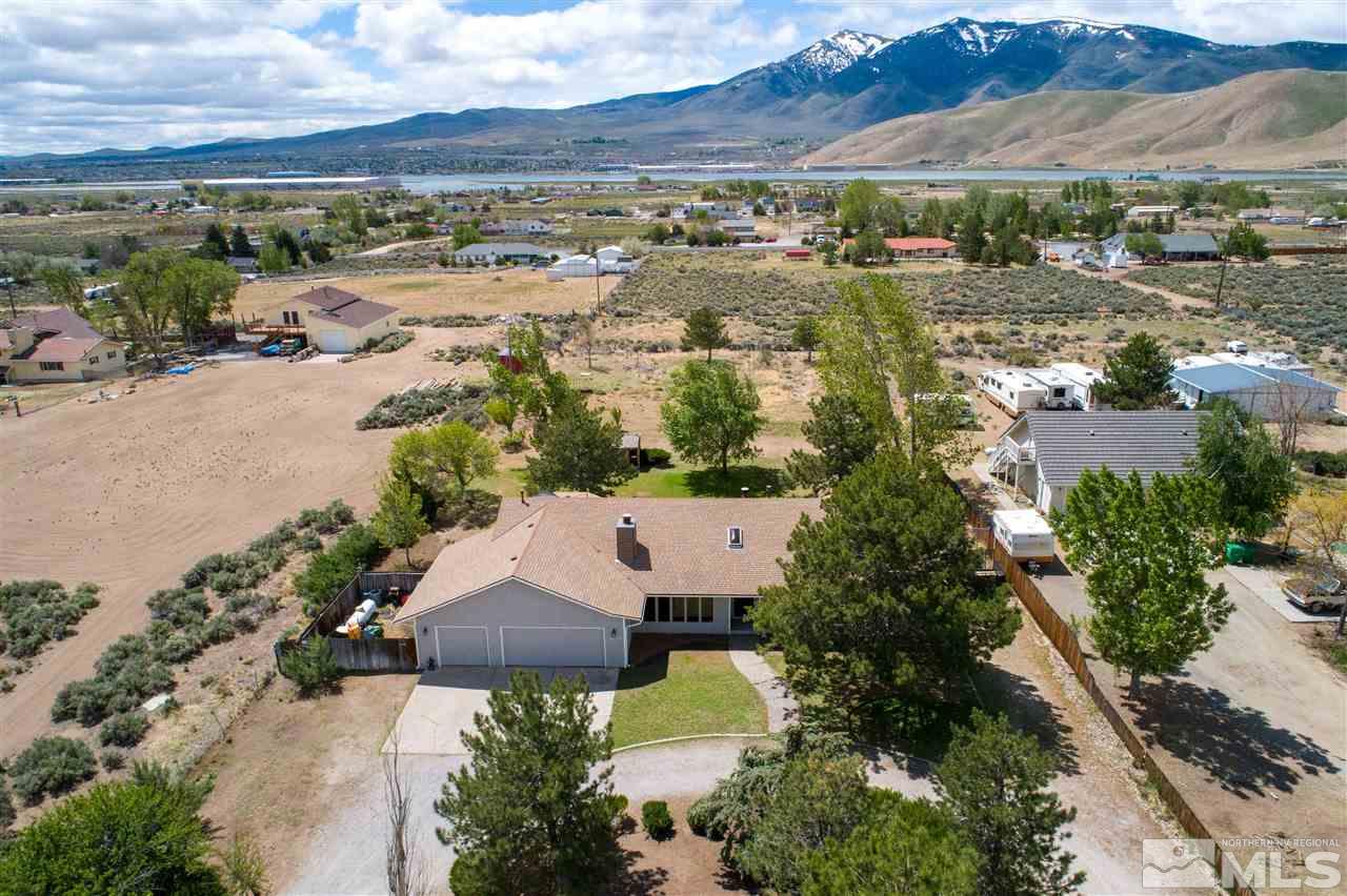 10813 Santa Fe Road Reno, NV 89508 - Photo 1 of 25 an aerial view of residential houses with outdoor space