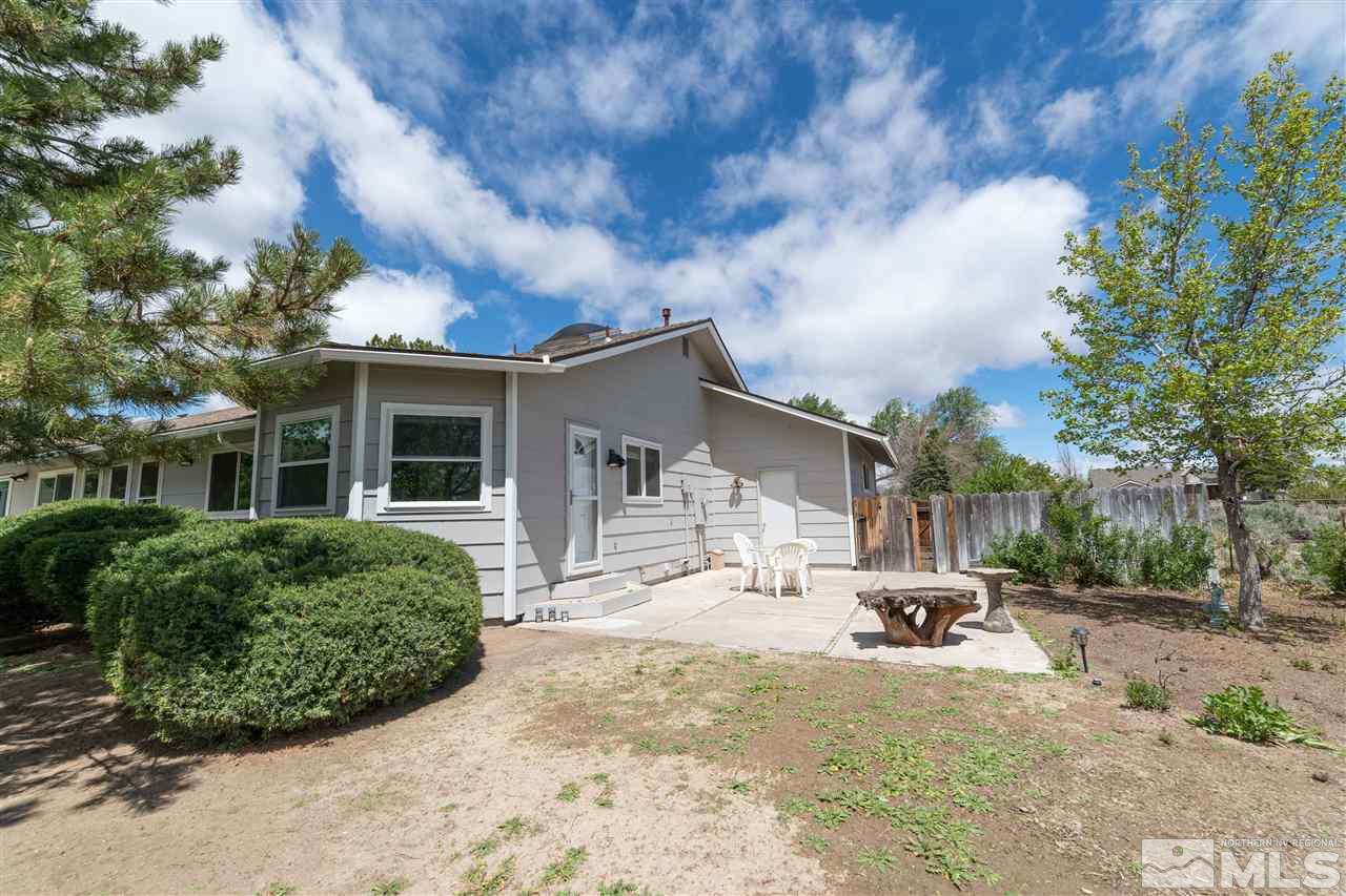 10813 Santa Fe Road Reno, NV 89508 - Photo 23 of 25 a view of a house with snow on the road
