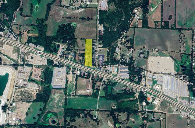 an aerial view of a house with outdoor space sitting space