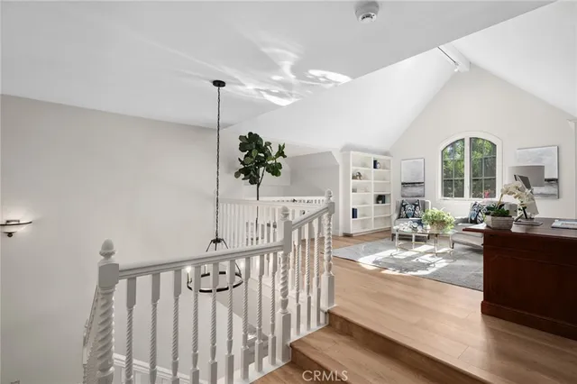 a view of a living room and hardwood floor