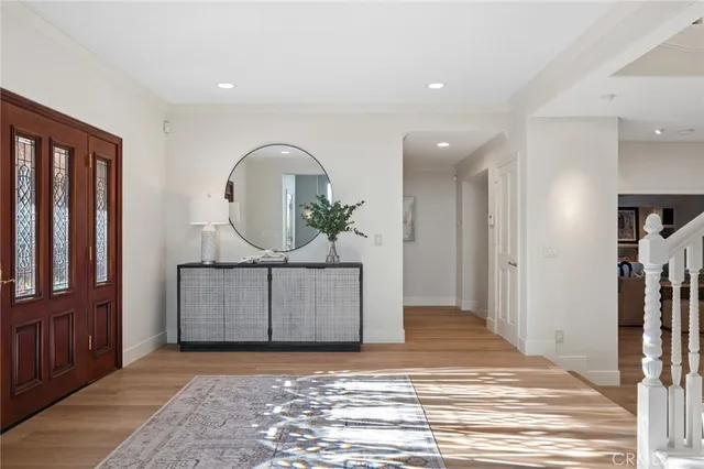 a view of entryway with wooden floor