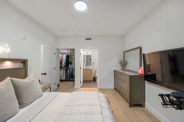 a room with furniture and a flat screen tv