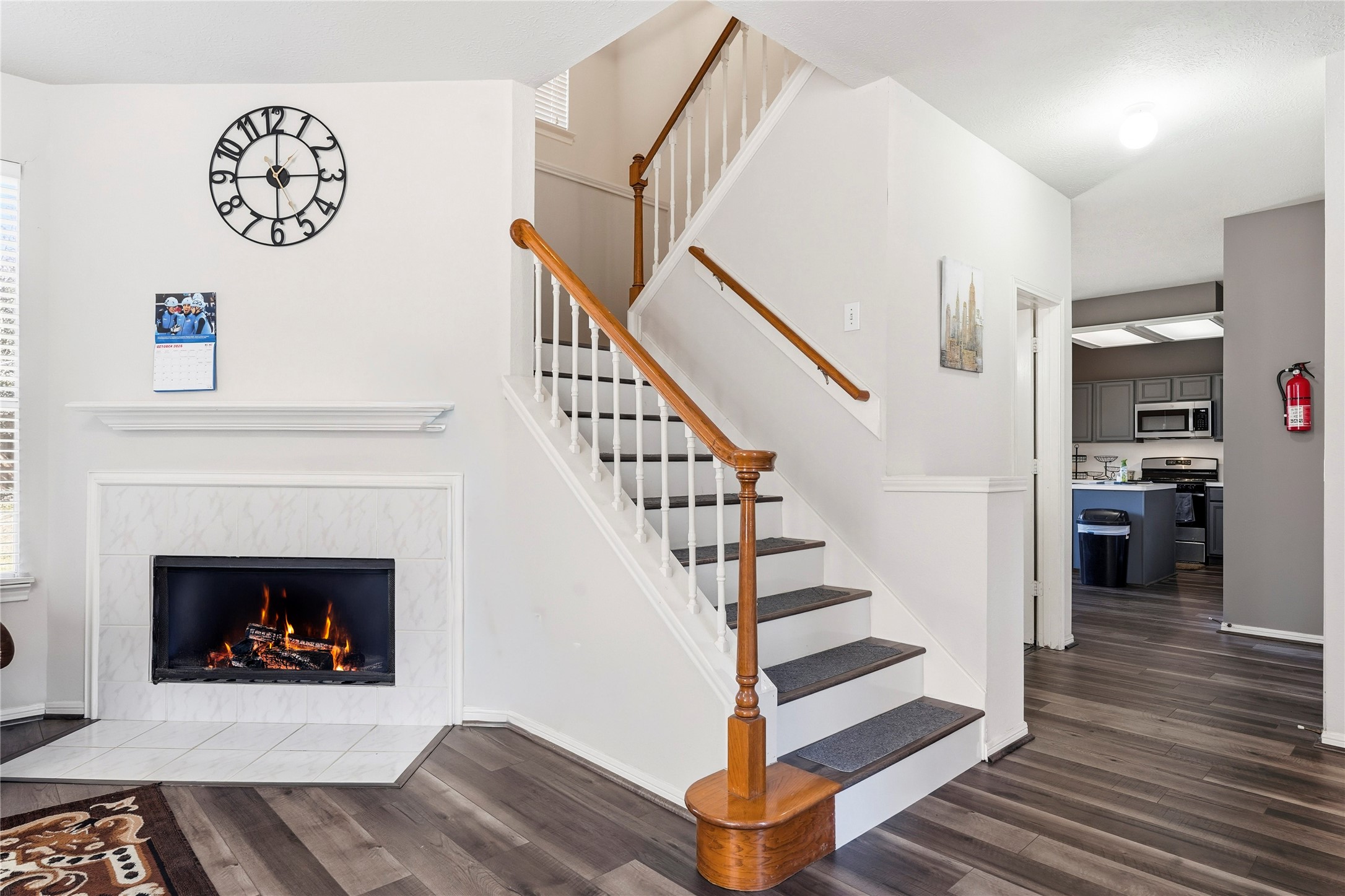 8706 Lone Maple Drive Houston, TX 77083 - Photo 11 of 27 a view of entryway and hall with wooden floor
