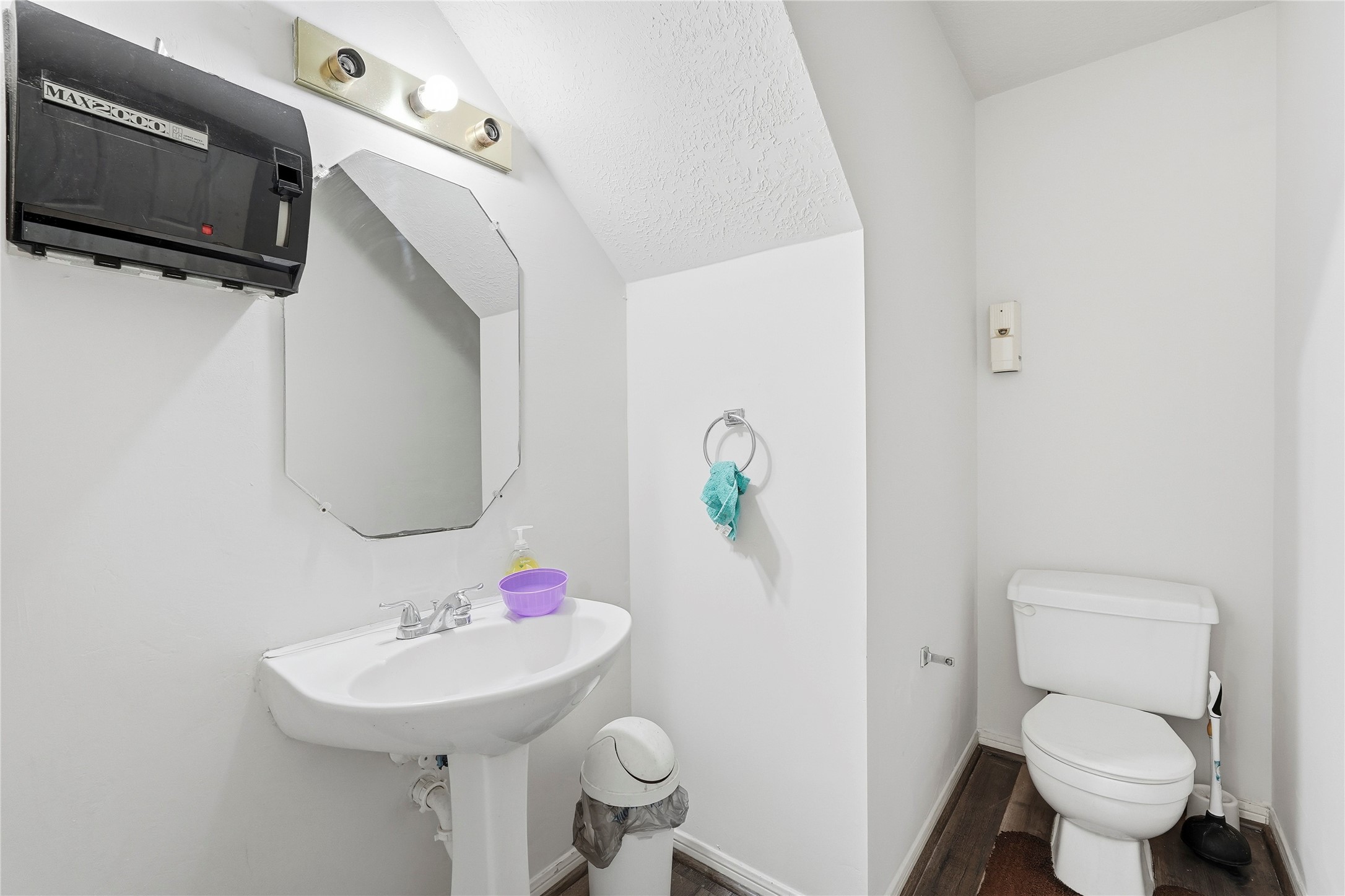 8706 Lone Maple Drive Houston, TX 77083 - Photo 12 of 27 a bathroom with a sink toilet and a mirror