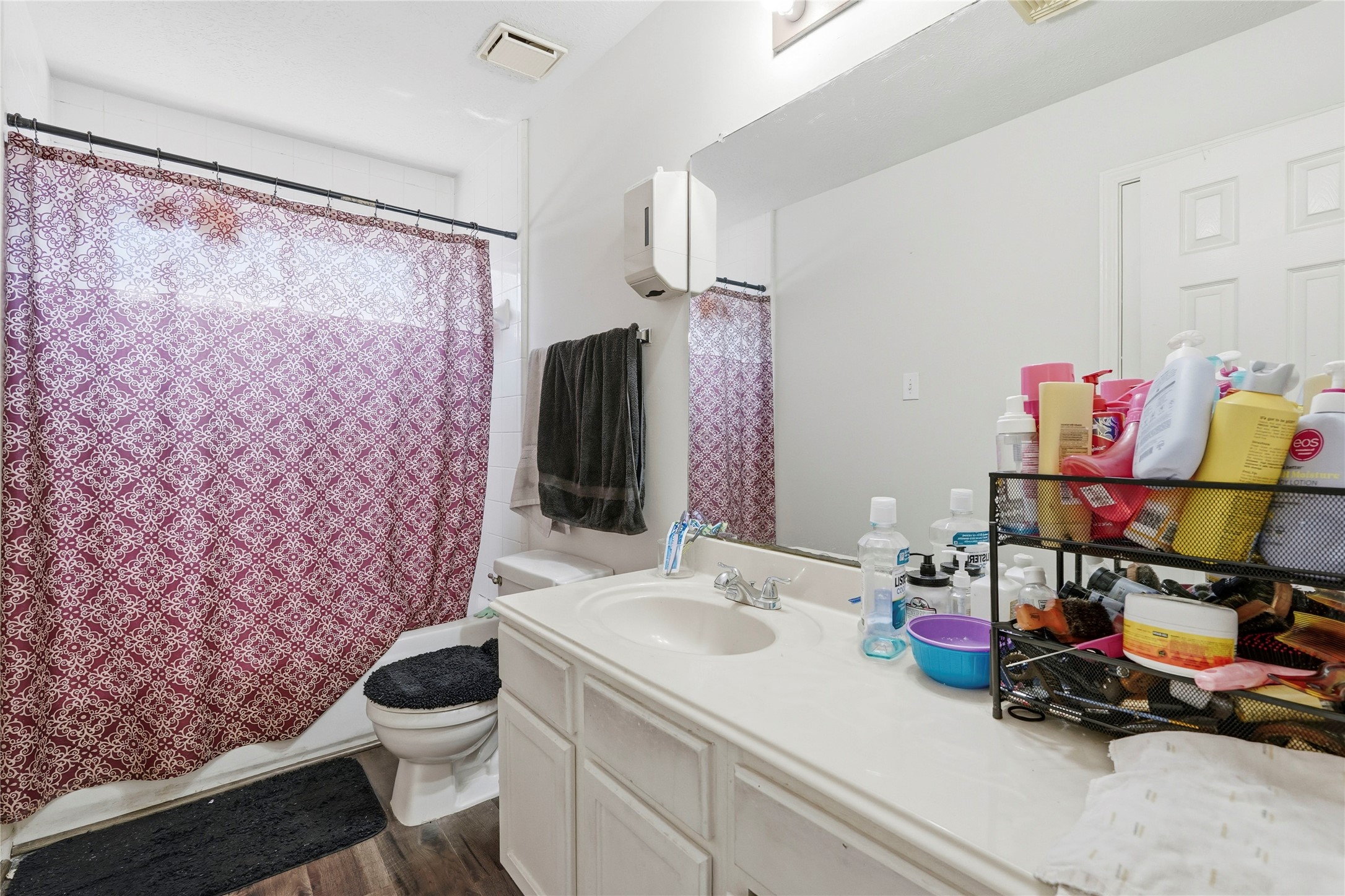 8706 Lone Maple Drive Houston, TX 77083 - Photo 20 of 27 a bathroom with a sink toilet and shower