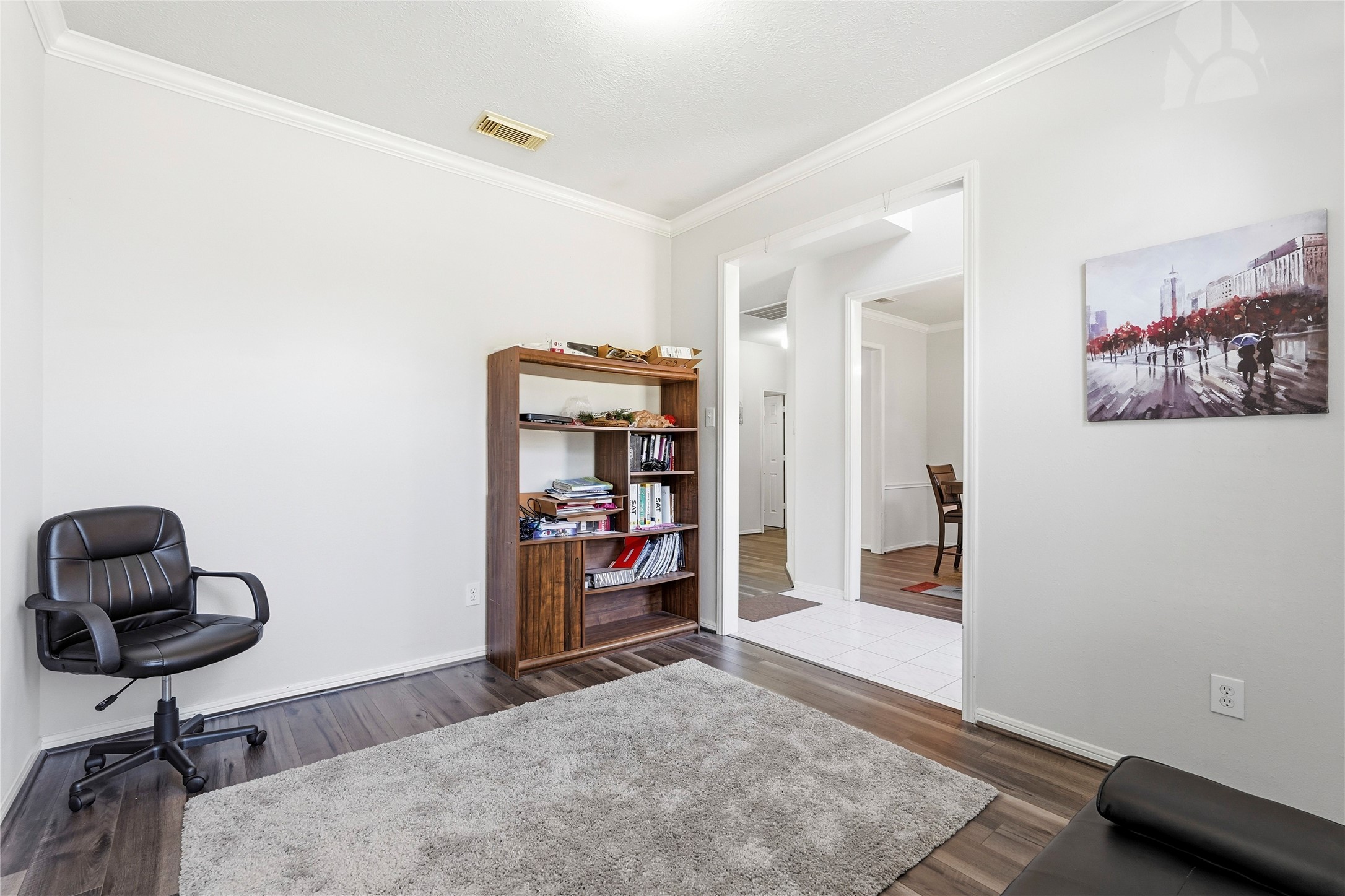 8706 Lone Maple Drive Houston, TX 77083 - Photo 5 of 27 a view of a workspace with furniture and a window