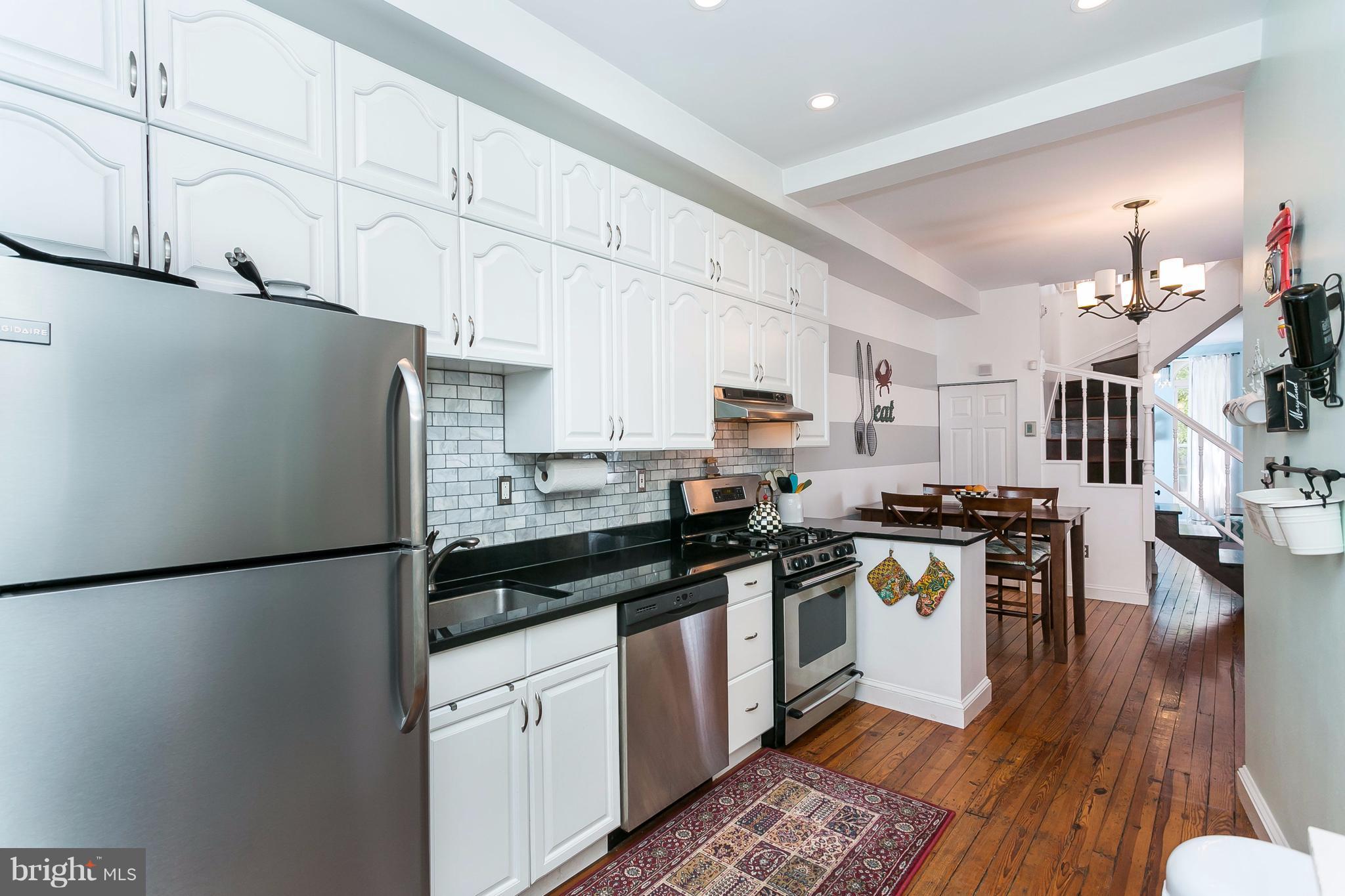1511 Riverside Avenue Baltimore, MD 21230 - Photo 11 of 30 Bright open kitchen w stone back splash