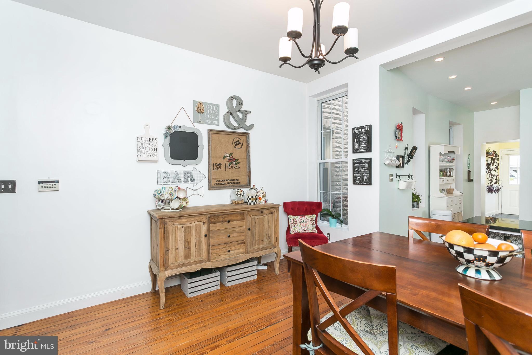 Dining room w window opens to kitchen