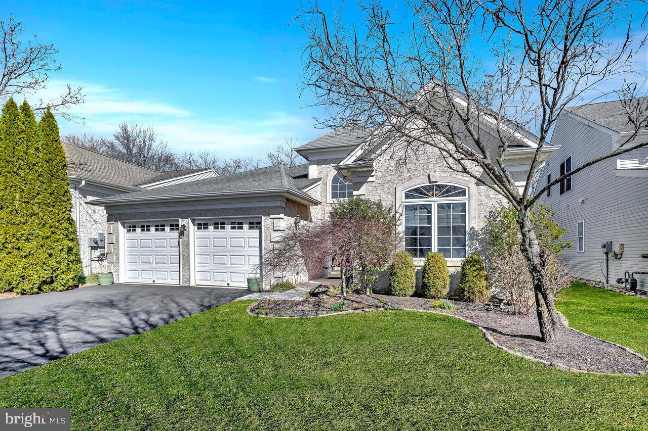 146 Aristotle Way Cranbury, NJ 08512 - Photo 1 of 36 a front view of a house with a yard