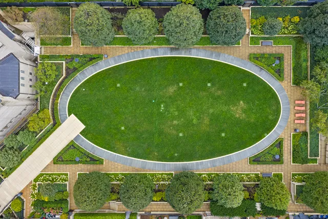 a view of a patio with couches and a fire pit