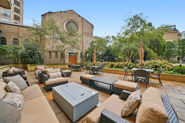 a view of a city with tall buildings