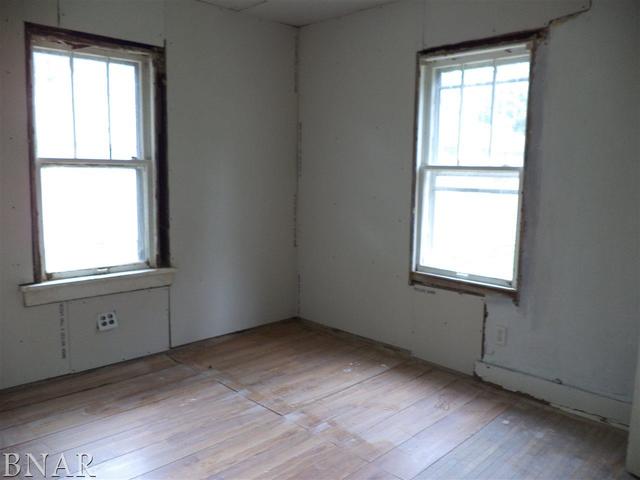 212 West Division Street Bloomington, IL 61701 - Photo 6 of 10 a view of an empty room with a window