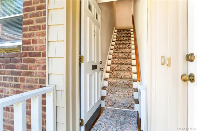a view of a hallway with windows
