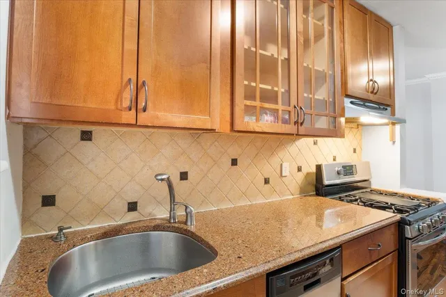 a kitchen with a sink and a window