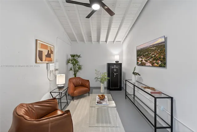 a front view of a house with a garden and yard