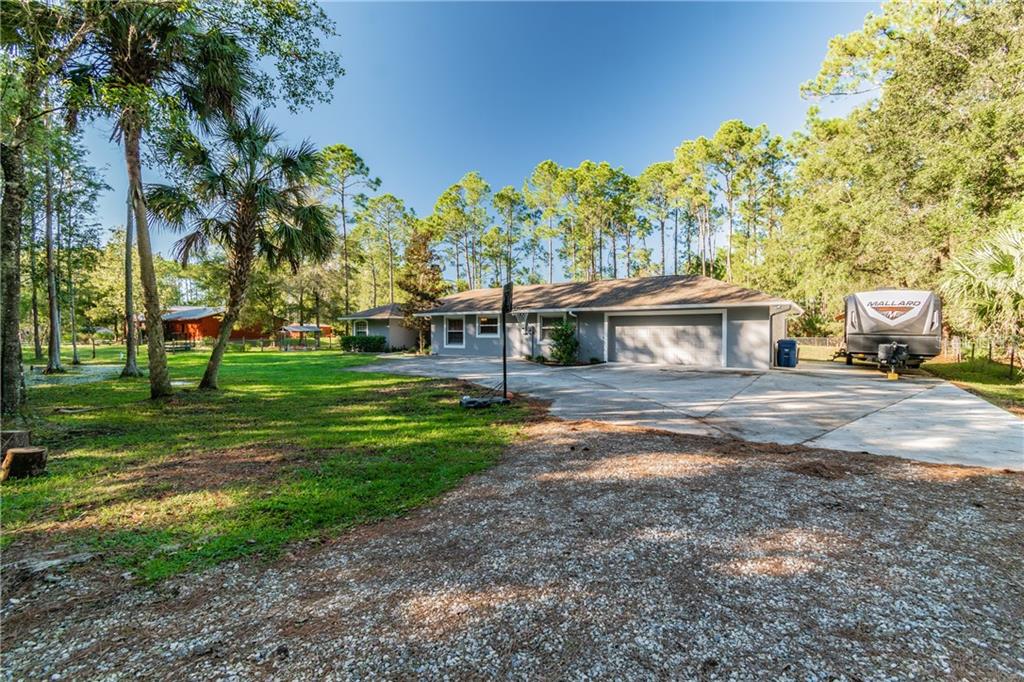 Beautiful home on one acre fully fenced lot with screened pool, attached inlaw apartment, barn and detached workshop. Bring your animals and outdoor toys. NO HOA or deed restrictions.