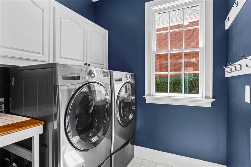 14375 Morning Mountain Way Milton, GA 30004 - Photo 21 of 53 a utility room with dryer and washer