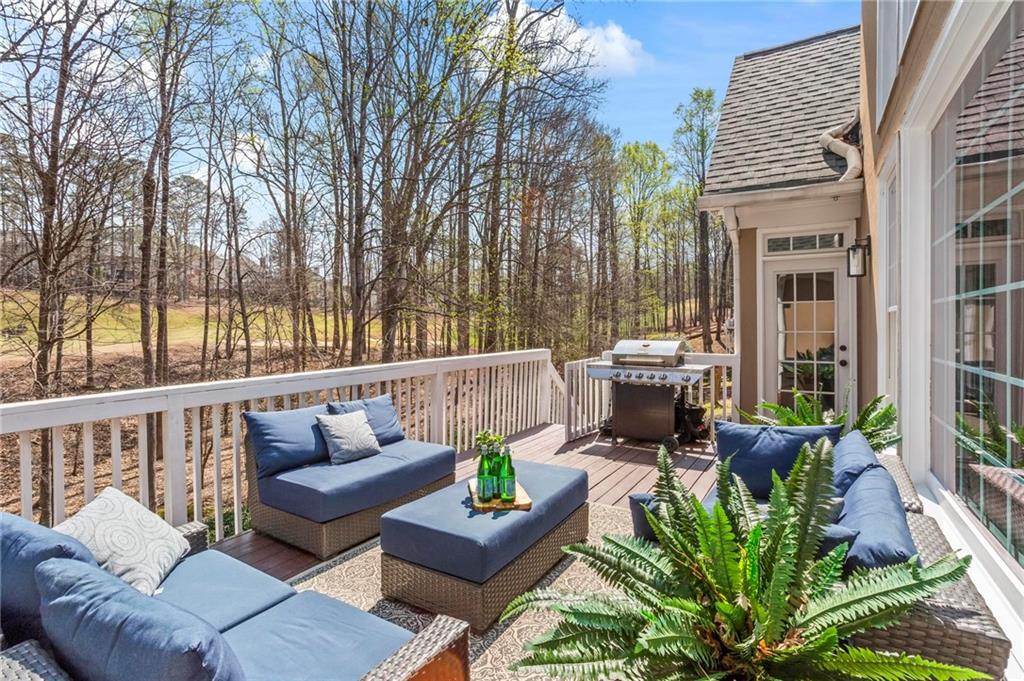 14375 Morning Mountain Way Milton, GA 30004 - Photo 29 of 53 a balcony with furniture and a potted plant