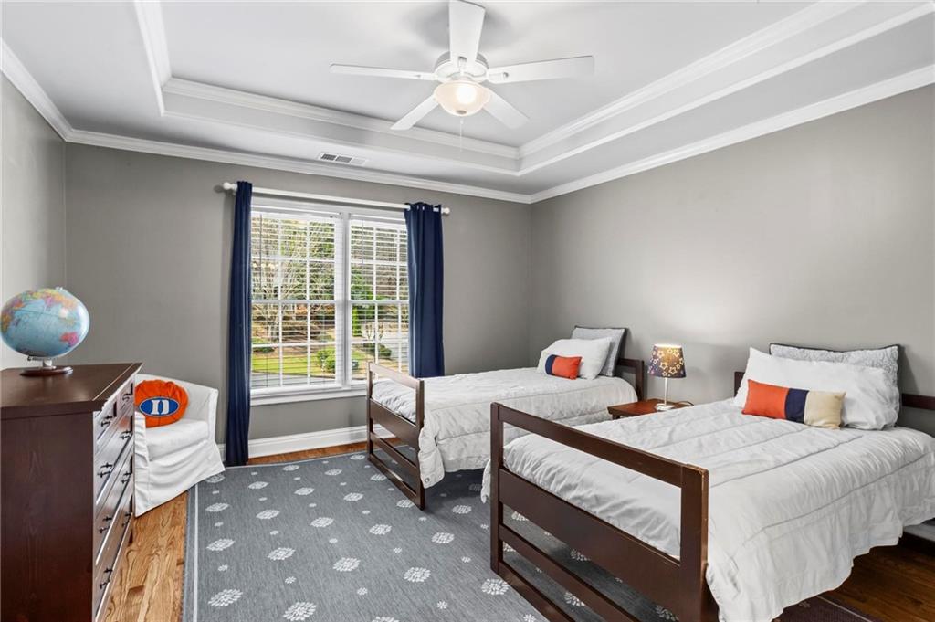 14375 Morning Mountain Way Milton, GA 30004 - Photo 35 of 53 a bedroom with two beds and a window