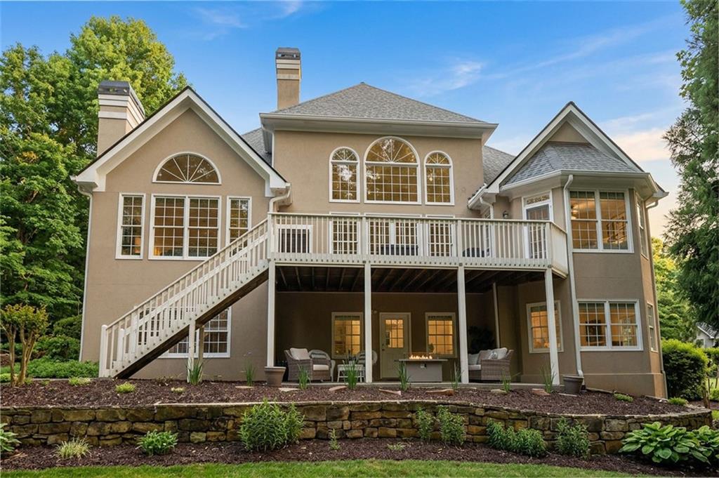 14375 Morning Mountain Way Milton, GA 30004 - Photo 45 of 53 a front view of a house with garden