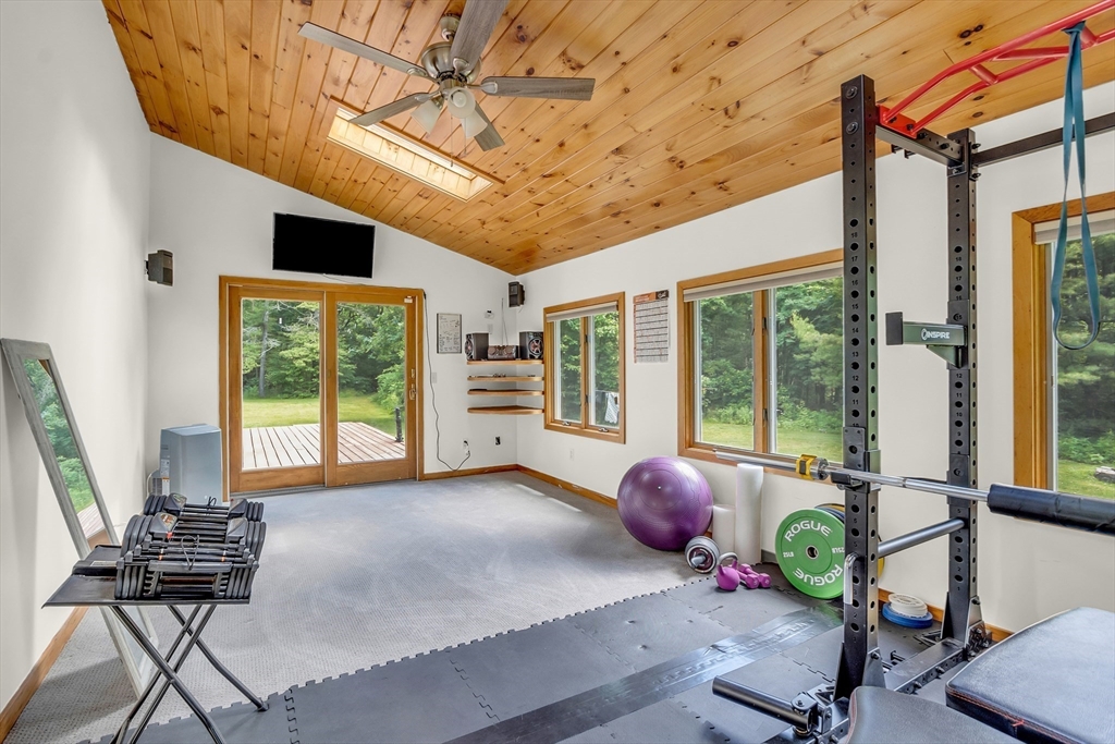 73 Off Ruggles Street Gilbertville, MA 01031 - Photo 21 of 38 a living room with furniture and large windows