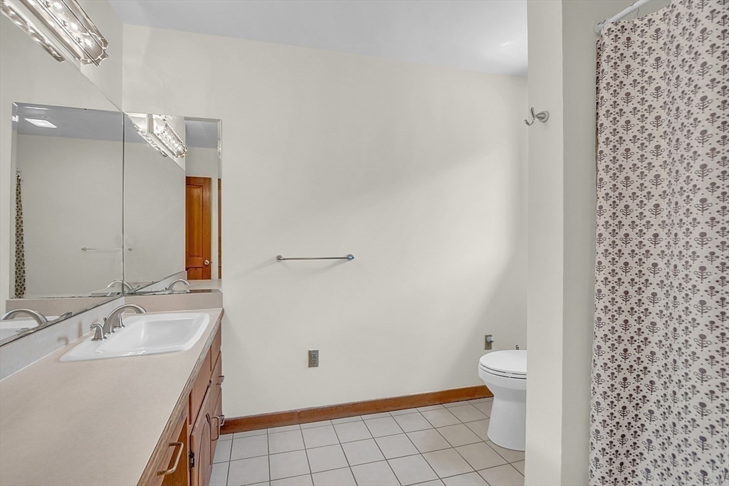 73 Off Ruggles Street Gilbertville, MA 01031 - Photo 22 of 38 a bathroom with a sink toilet and shower
