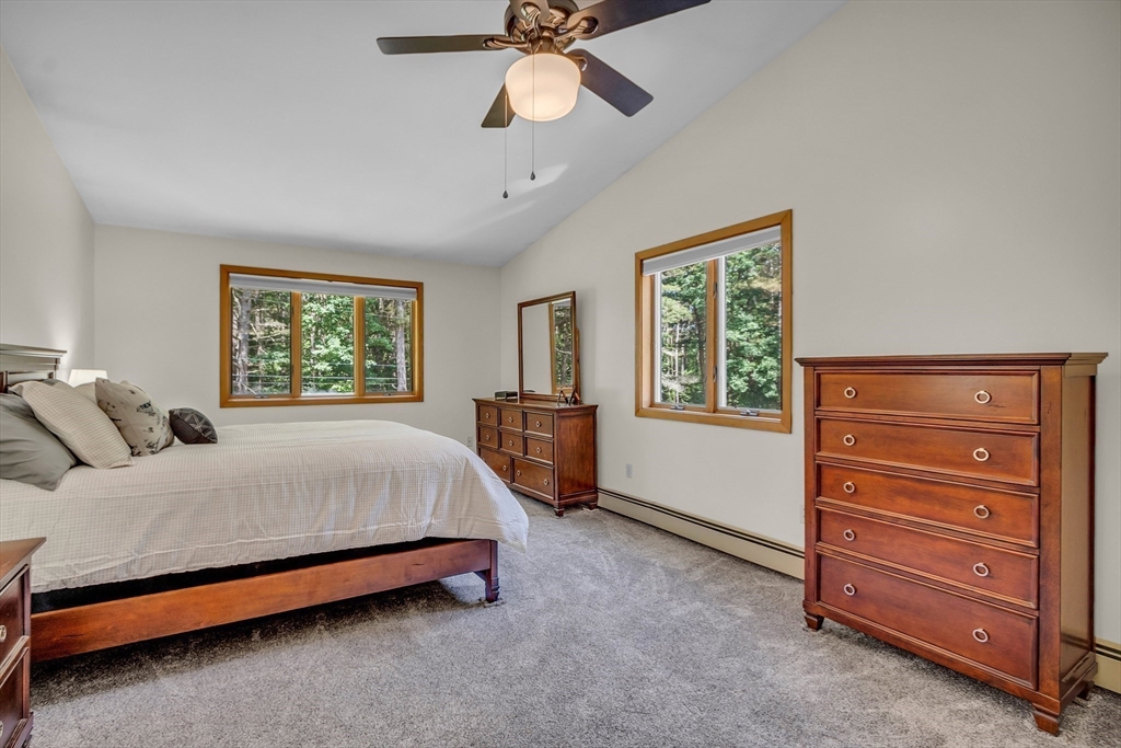 73 Off Ruggles Street Gilbertville, MA 01031 - Photo 23 of 38 a bedroom with a bed and a dresser