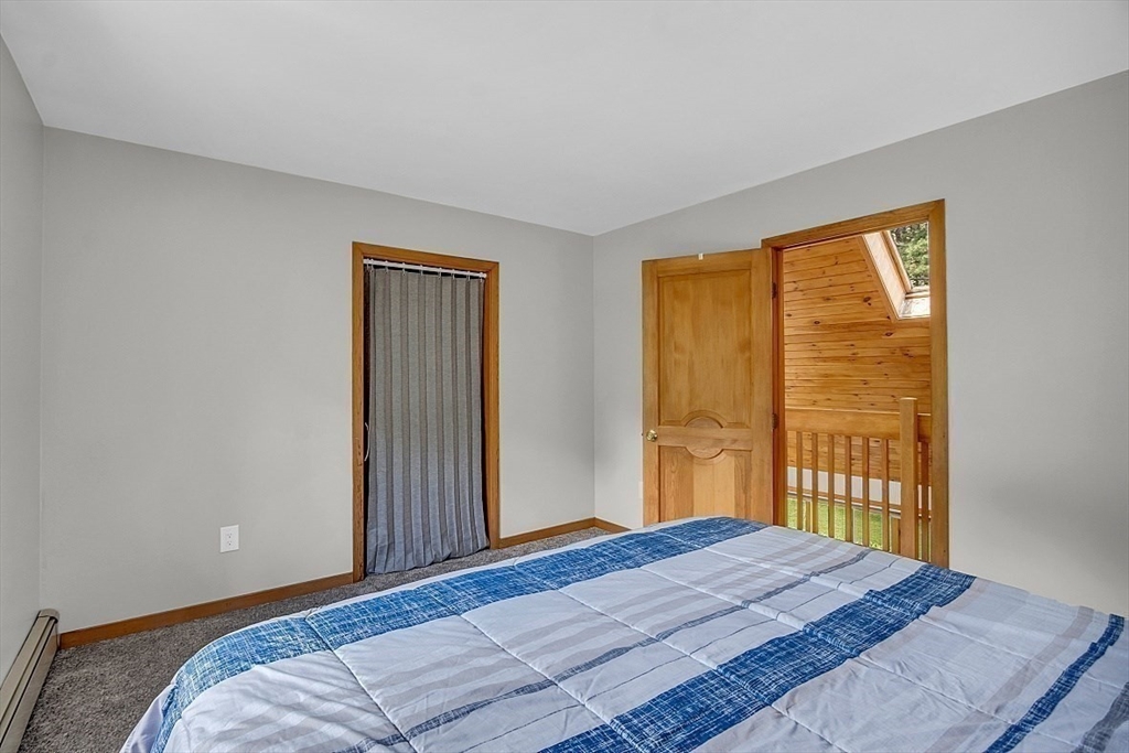 73 Off Ruggles Street Gilbertville, MA 01031 - Photo 26 of 38 a bedroom with a bed and a window