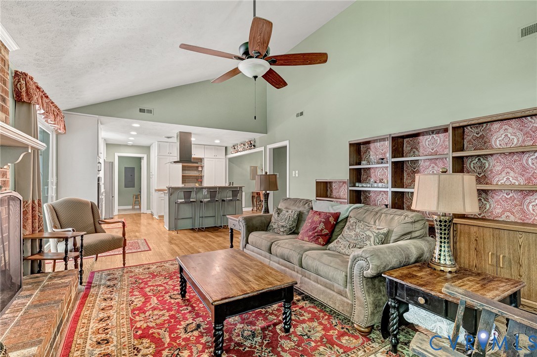 3841 Strawhill Road Richmond, VA 23231 - Photo 21 of 56 Vaulted ceilings, wood-finish flooring, built-in s