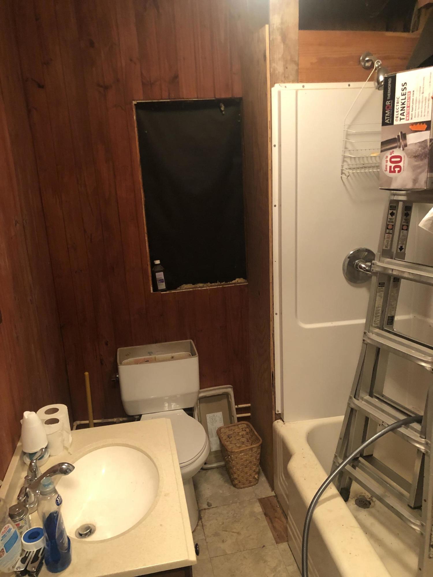 1070 Philpott Road Henry, VA 24102 - Photo 10 of 22 a bathroom with a toilet and a mirror