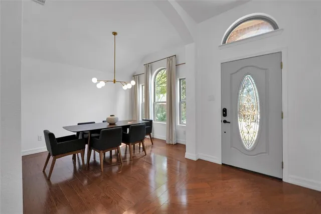 a table and chairs in a room
