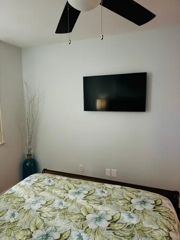a bathroom with a bath tub sink and mirror